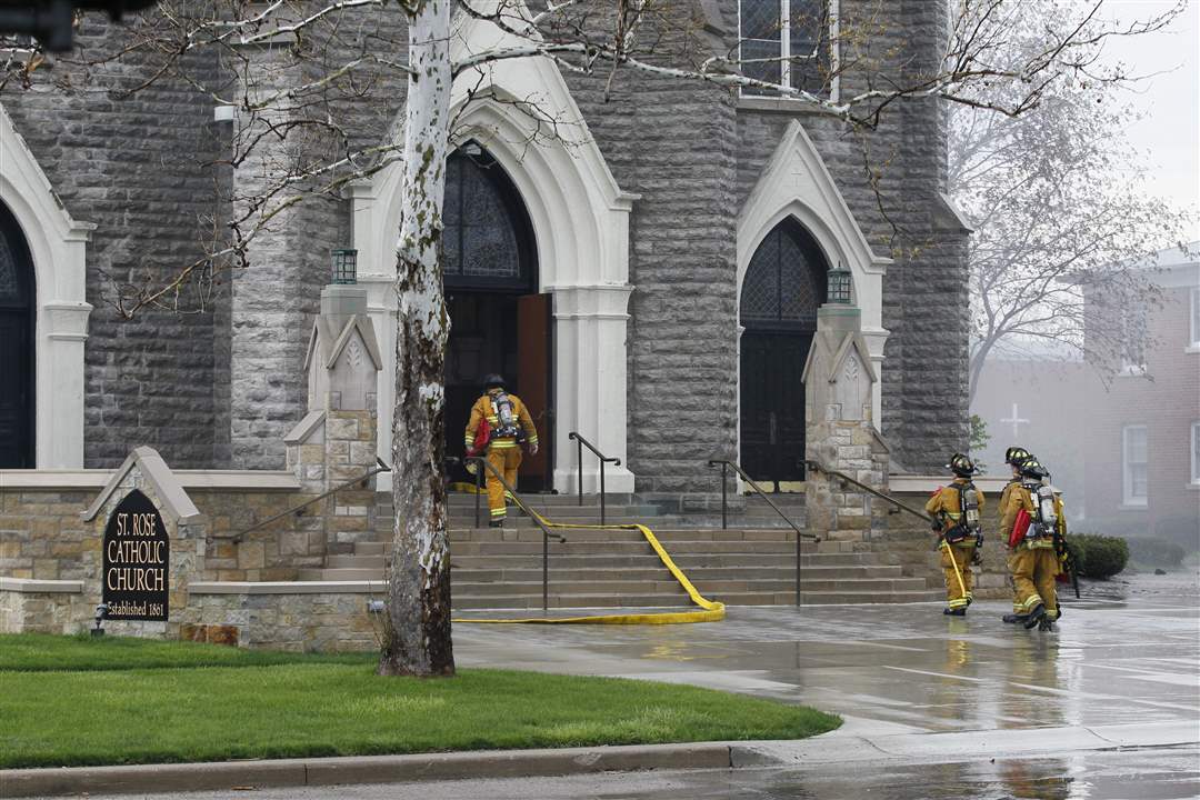 Firefighters-enter-St-Rose-Church-in-Perrysburg
