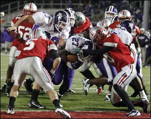 Central Catholic's Jayme Thompson, right, is the eighth high school senior to flip his commitment to Ohio State this year.