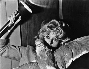 Tippi Hedren is attacked by a bird in a scene from Alfred Hitchcock's 'The Birds,' showing at the Valentine Theatre at 7:30 p.m. Friday. Admission is $5.