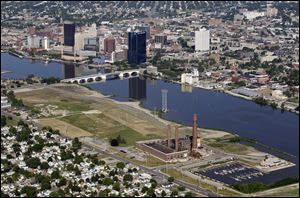 The city of Toledo has owned the Acme building since 2003. Officials say it is a safety hazard that must be eliminated.