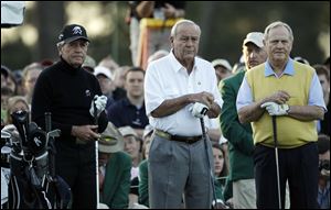 Honorary players, from left, Gary Player, Arnold Palmer and Jack Nicklaus wait to tee off on the first hole Thursday before the first round of the Masters golf tournament in Augusta, Ga.