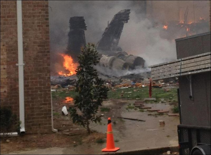 Navy jet crashes into apartments in Virginia Beach, Va. - Toledo Blade