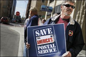 Dennis Carman, president of the letter carriers Branch 100, said the cuts to the Postal Service are not necessary. Organizers said the pending legislation would ultimately end door-to-door delivery.