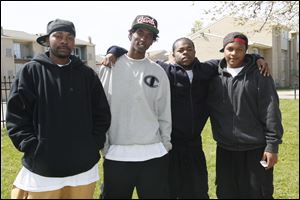 Marquise Noble, left, Victor Watson, Jr., Keith Furr, and Antwan Goetz deny that they belong to a gang. Watson was convicted of a felony drug charge several years ago. Now, he says, he wants to get a job and stay out of trouble. 
