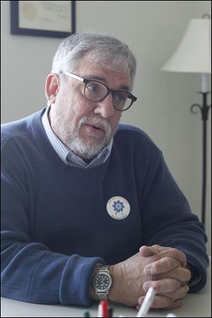 Jack Frech, director of Job and Family Services in Athens County, is a prominent critic of welfare reform.