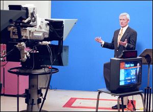 Stan Stachak presents the 5 p.m. forecast in 1997.