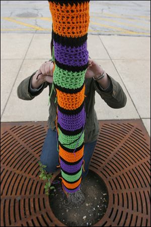 Yarn bombing, guerrilla knitting, or graffiti knitting is starting to show in Toledo's urban areas.