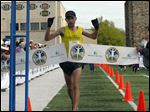  Matt Folk finishes first in the Glass City Marathon on Sunday, becoming the first three-time winner in the 36-year history of the running event. His winning time was 2 hours, 26 minutes, 27 seconds.