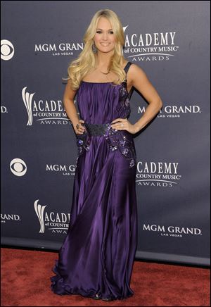 Carrie Underwood arrives at the 46th Annual Academy of Country Music Awards in Las Vegas.