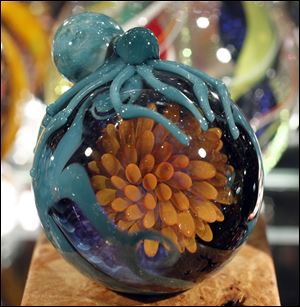 An octopus sits atop this ocean-themed sphere by Josh Mazet in Conklin's collection.