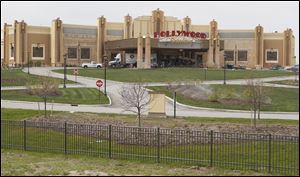 Toledo's Hollywood Casino is scheduled to open May 29. Ohio casinos may have competition if a bill in the General Assembly allowing a card gaming room in the name of charity in every county passes.
