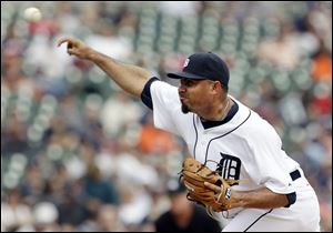 Detroit Tigers relief pitcher Joaquin Benoit throws against the Kansas City Royals in the ninth inning of a baseball game in Detroit.