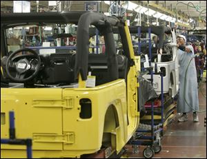 Workers building the Jeep Wrangler in Toledo are expected to get a couple of extra paychecks this year without the summertime pause.