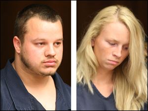 Joshua Waxler, left, and Courtney Waxler are arraigned Thursday in Toledo Municipal Court.