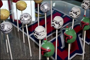 Star Wars cake pops are on hand to help celebrate.