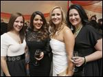  Emily Wares, Negar Cooper, Emily Youssef, and Melanie Burns at the Taste of the Nation at the Toledo Club. 