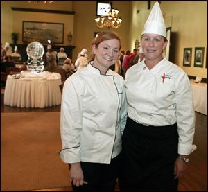 Left to right Brandi Smith and Gretchen Fayerweather during the Maumee Valley Chefs' Association 32nd Annual Scholarship and Awards Dinner at the Inverness Club in Toledo.
