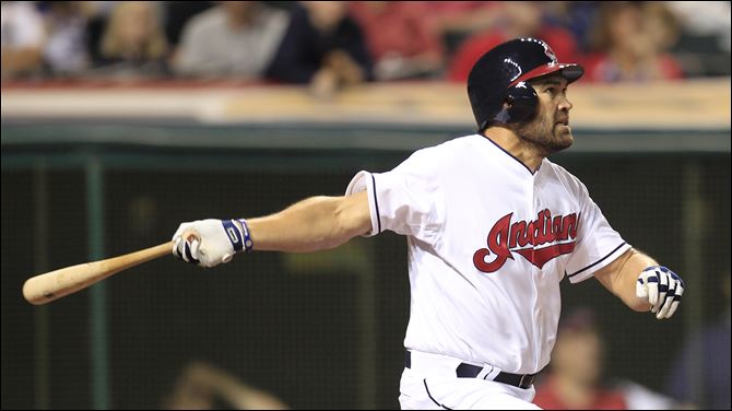 Cleveland-Indians-Johnny-Damon-watches-his-ball-after-hitting-a-two-RBI-triple.jpg