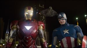 Roberty Downey, Jr., and Chris Evans, right, play Iron Man and Captain America in Marvel's 'The Avengers.'