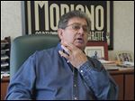  Kip Diacou says he was robbed in the driveway of his Point Place home early Monday morning.  He said nearly every neighbor he knows has been burglarized in the past couple of years. 'These poor neighbors. They have these lights on all night and they are afraid to leave their homes.'