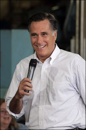 Republican presidential candidate, former Massachusetts Gov. Mitt Romney said President Obama followed his lead in ushering the auto industry through a managed bankruptcy and that he'll take 'a lot of credit' for its success.