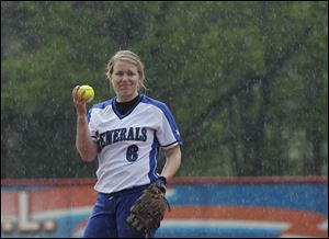 Anthony Wayne pitcher Lydia George signals to the umpire that the ball is too wet during the Generals' game April 30 at the Springfield Sports Complex in Holland.