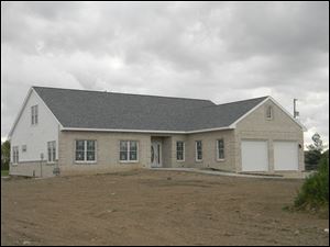 High school students from Penta Career Center buit this 2,200-square-foot home at 10663 Eckel Junction Rd. It is to be open for public viewing May 20 from 1 to 4 p.m. 