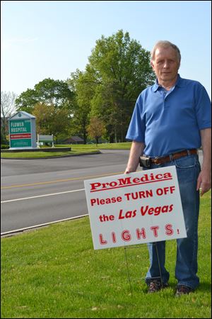Jim Ike, who lives on Harroun Road near Flower Hospital, has submitted a petition to city council calling for it to ask ProMedica to douse the lights on the hospital.