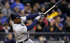 Detroit Tigers' Austin Jackson hits an RBI sacrifice fly against the Seattle Mariners in the sixth inning Wednesday night.