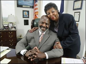Mayor Mike Bell poses in his office with his mother, Ora Bell.