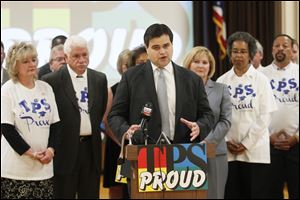 Toledo City Council President Joe McNamara, with Toledo Public Schools officials and community leaders, talks about the importance of supporting the TPS levy that will be on the November ballot, during a news conference at the TPS administration building in Toledo.