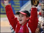  Rebecca Eppard, 10, a fourth grader at Lake Elementary School, cheers for Toledo.