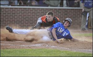 Anthony Wayne’s Josh Schwerer is tagged out by Ashland catcher Jordan Blair in the fi fth inning. Th e Generals are 23-3.