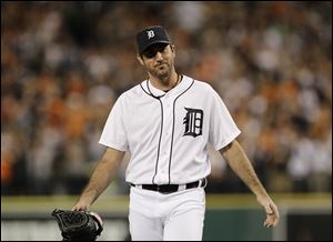 Detroit Tigers pitcher Justin Verlander reacts after beating the Pittsburgh Pirates 6-0 in an interleague baseball game, Friday, in Detroit. Verlander allowed one hit in the ninth inning.