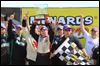  Chris Buescher celebrates with the Menards 200 trophy after beating Frank Kimmel to the finish line by .114 seconds Sunday afternoon.