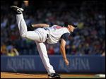  The Mud Hens' Jacob Turner fires in a pitch during the first inning against the Syracuse Chiefs at Fifth Third Field on Saturday. The Hens pitcher gave up four earned run in six innings pitched, striking out six and walking two in Toledo's 8-5 loss.