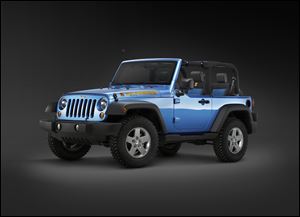 After Chrysler reconfigured the catalytic converter for the 2010 Jeep Wrangler, the changes created a gap between the converter and the transmission where debris can become lodged and catch fire.
