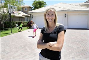Melissa Santee, who sold her home in Parkland, Fla., has negotiated a rental agreement that allows her family to stay put until after the school year ends. She hopes the transition easier for her children. 