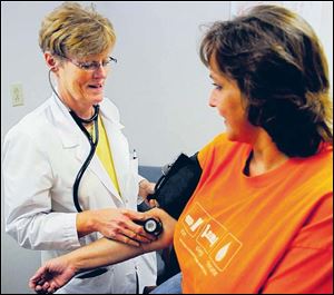 Nurse practitioners are well-trained and capable of checking blood pressure, as well as other routine checks.
