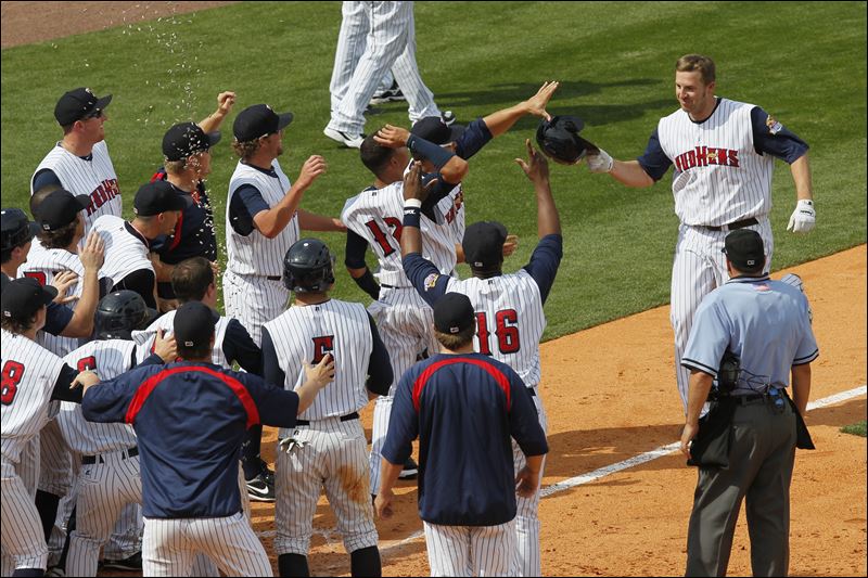 - Brad-Eldred-greets-teammates-after-home-run