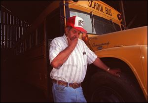 In 1992, Frank Edward Ray stood by the bus that he was driving when it was hijacked in 1976 near Fresno, Calif., with 26 summer school students on board. He bought the bus to save it from being scrapped and later donated it to a museum.