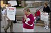  Pat Hanusz, of Corpus Christi University Church, prays in front of Rosary Cathedral on Tuesday in support of Catholic nuns.  Hanusz said, 