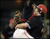  Bowsher pitcher Jake Almanza, right, celebrates winning the City League baseball championship game with catcher Reid Puligandla on Tuesday at Bowman Park.
