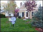  microsite SYLVANIA HOMES    received 04/13/2012       The Blade/Åshley Sepanski           A for sale sign sits in the yard of a home at 5918 Highland View Dr. in Sylvania.