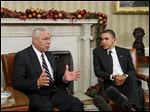  Former Secretary of State Colin Powell meets with President Barack Obama, in the Oval Office at the White House in December, 2010.