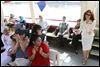  Najwa Badawi, standing, gets a round of applause from her students as they set out aboard the Sandpiper. Wednesday's excursion included foods of many cultures as well as line dancing plus Arabic music and all-American tunes including 'Yankee Doodle Dandy' and 'Hail to the Chief.'
