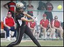 Perrysburg's Katie Dunphy (14) hits a home run against Elyria in the first inning during.