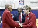 Ret. Col. Harold Brown, a former Tuskegee Airman, left, greets Rep. Marcy Kaptur while Rev. Dr. Otis J. Gordon, Jr. center looks on during the 97th Annual Memorial Day program.