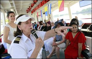 Mary Dalby, the Sandpiper's owner/operator, points out the sights to students of Najwa Badawi's class.