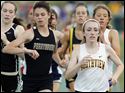 Alison Work of Sylvania Northview and Courtney Clody of Perrysburg compete in the 1600 meter run during the Division I regional track meet Friday, 05/25/12, in Amherst, Ohio.